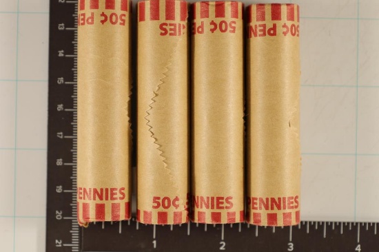 6 SOLID DATE ROLLS OF US COINS: 4-50 CENT ROLLS