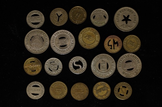 20 ASSORTED METAL TRANSPORTATION TOKENS: