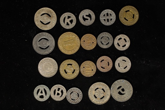 20 ASSORTED METAL TRANSPORTATION TOKENS: