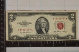 1953 US $2 RED SEAL NOTE, SOME RED INK ON TOP EDGE