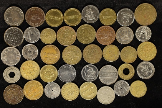 40 ASSORTED AMUSEMENT PARK AND ARCADE TOKENS: