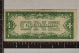 1928-A US $1 FUNNY BACK SILVER BLUE SEAL
