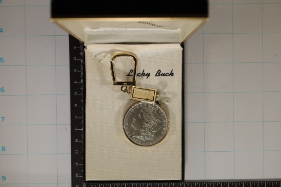 1879 MORGAN SILVER DOLLAR IN SWANK KEYCHAIN AND
