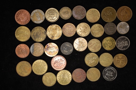 36 ASSORTED AMUESMENT / ARCADE TOKENS: LASER