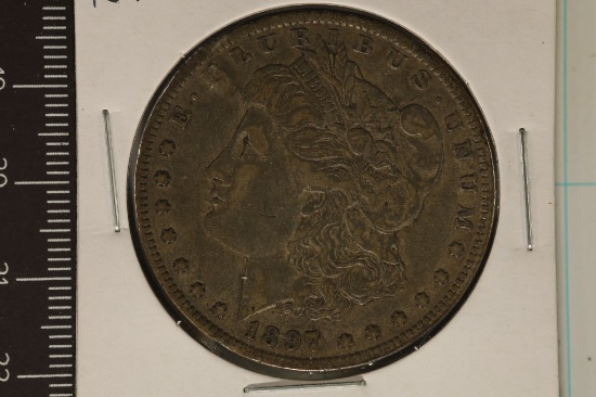 1897-O MORGAN SILVER DOLLAR WITH DENT CHOP MARK