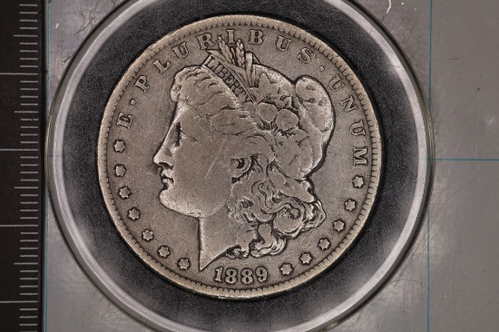 1889-O MORGAN SILVER DOLLAR IN HARD PLASTIC