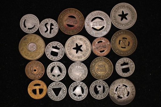 20 ASSORTED METAL TRANSPORTATION TOKENS: