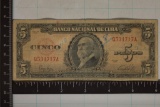 1949 CUBA 5 PESO BILL WITH INK ON THE OBVERSE.