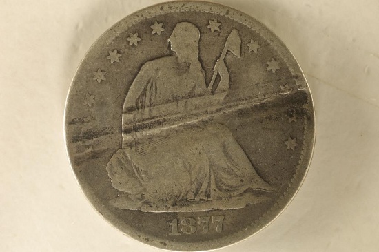 1877-S SILVER SEATED LIBERTY HALF DOLLAR. DAMAGED