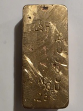 Auction photo of 21.94 OZ. NORDIC GOLD BAR BY L AND F ARTWORK