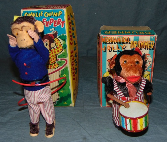 Two Boxed Wind Up Toys.