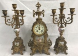 Pair of Gilt and Porcelain Candelabra & Clock.