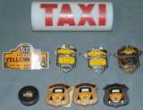Assorted Taxi Badges and Light