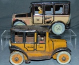 2 Early Tin Taxis