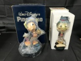 (2) Disney Jiminy Cricket Figurines