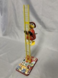 Linemar Donald Duck Climbing Fireman Toy.