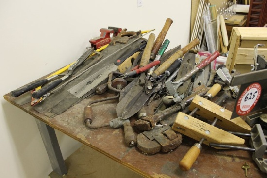 Table W/Contents, Miter Saw, Various Hand Saws, Pull Saw, Pipe Wrenches, et