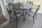Wrought Iron Outdoor Table w/ (4) Wrought Iron Side Armed Chairs
