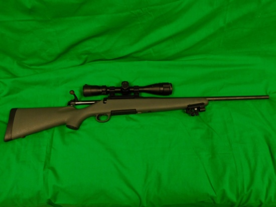 Remington Model 710 Bolt Action Rifle, 30.06 w/ 4 x 16 x 4 Scope Centerpoin