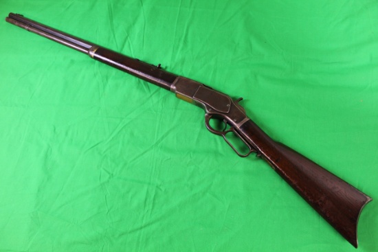 Winchester 1873, caliber 38/40, s/n 511865b.  Dust cover is present and fun