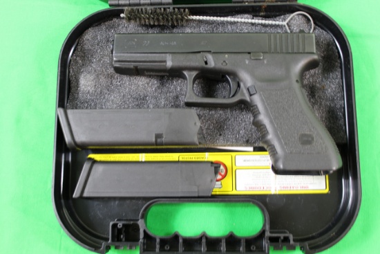 Glock 22, caliber 40 S&W, s/n HVL179.  2 mags total, original box.  98%