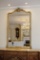 Beveled Mirror, 19th Century, gilted w/real gold leaf frame, an arched top