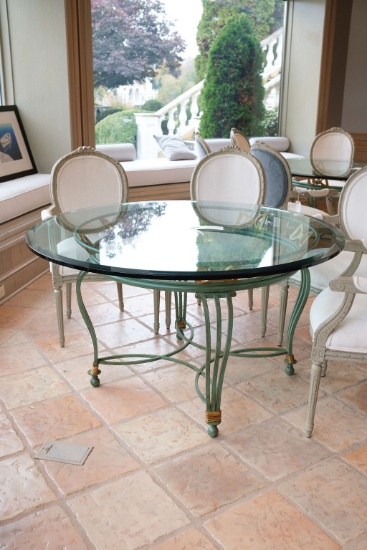 54" Diameter  Iron and glass table 1/2 " thick glass top painted iron base