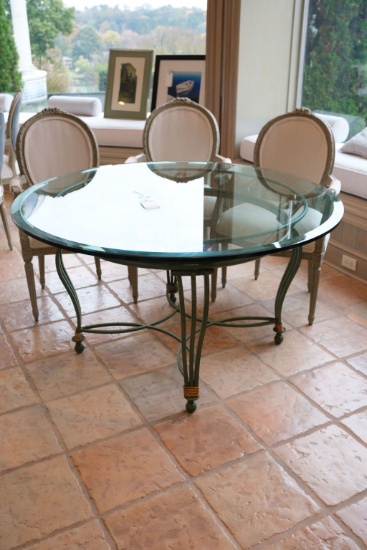54" Diameter  Iron and glass table 1/2 " thick glass top painted iron base