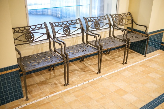 Set of (4) cast aluminum patio chairs with dolphin arms ,  Approx.30"H  x 2