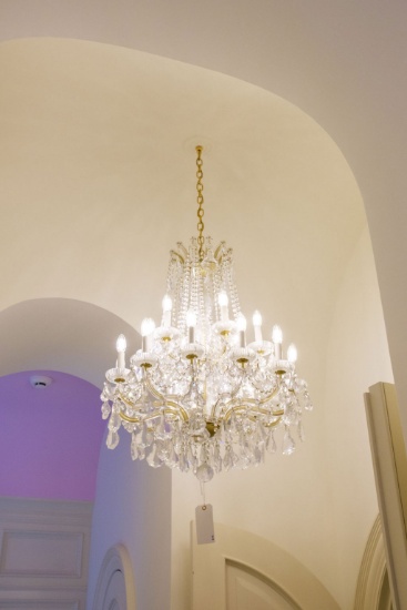 Brass and glass chandelier  2 tier , 18 light w/prisms and swags,  Approx.
