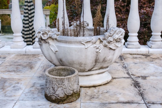 Assorted Lot to include (2) oval concrete planters with flower decorations,