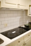 Miele cooktop with exhaust 5 burner glass top, Model # KM191, Approx.   20