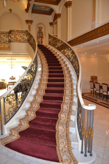 Custom Iron Railing w/scroll work and floral motif, including white wooden