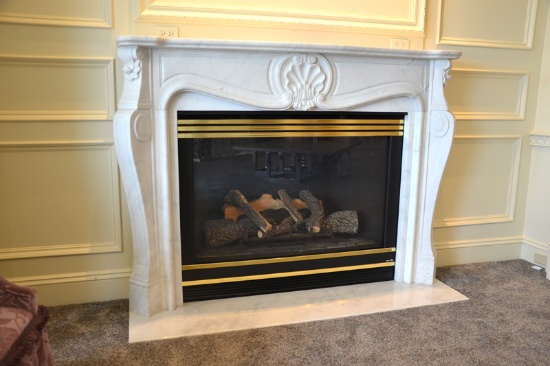 Marble Fireplace mantel w/shell motif  and Gas heat n glow insert, approx.