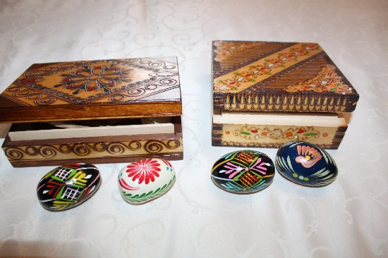 Two Hand Painted Wooden Engraved Boxes, One Containing Wooden Eggs, One 7"