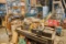 Contents Of Two Tables, Assorted Batteries, Wheels, Chisels, Battery Charge