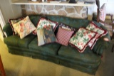 Green Sofa and Assorted Accent Pillows