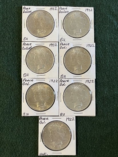 (7) Peace Dollars: (1) 1922 No Mint Mark Uncirculated, (6) 1922 No Mint Mar