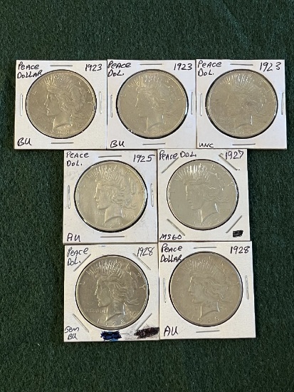 (7) Peace Dollars: (1) 1923 No Mint Mark Uncirculated, (2) 1923 No Mint Mar