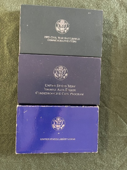 (3) Commemorative Coin Sets: 1986 Ellis Island Liberty Dollar, 1986 Liberty