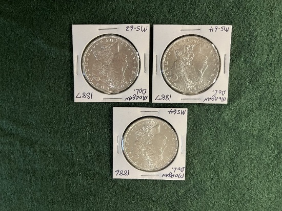 (3) Morgan Dollars: (1) 1886 No Mint Mark MS-64, (1) 1887 No Mint Mark MS-6