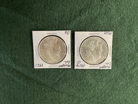 (2) Morgan Dollars: (1) 1904 Mint Mark O MS-64, (1) 1921 No Mint Mark BU