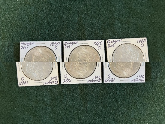 (3) Morgan Silver Dollars (1) 1880 Mint Mark O Uncirculated, (1) 1880 Mint