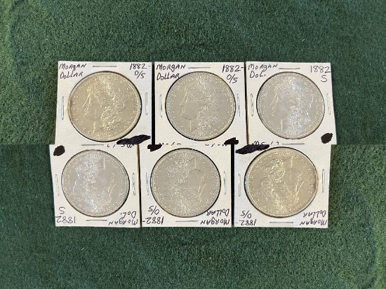 (5) Morgan Silver Dollars: (1) 1982 Mint mark O/S AU, (1) 1882 Mint Mark O/