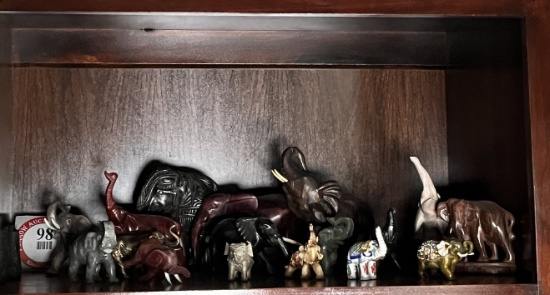 Contents of Shelf, Assorted Decorative Elephants of Various Sizes