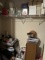 Contents of Closet: Dolls, Presidential Mask, Boxes, Doll Stands, Games