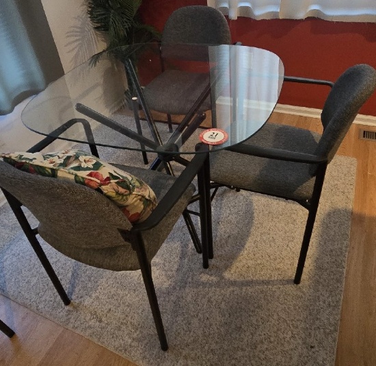 Glass top Table plus 4 Chairs