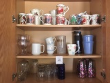 THREE SHELVES OF MUGS & GLASSES