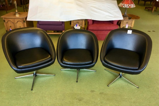 Three Faux Leather Swivel Chairs