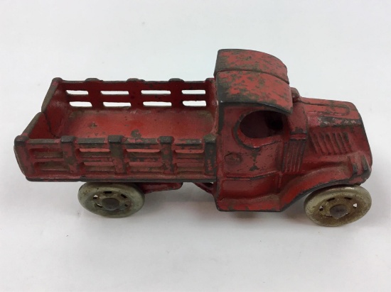 VINTAGE RED PAINTED CAST IRON TRUCK